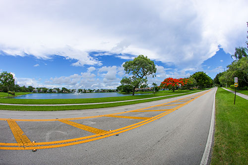 Roadway with lake in distance